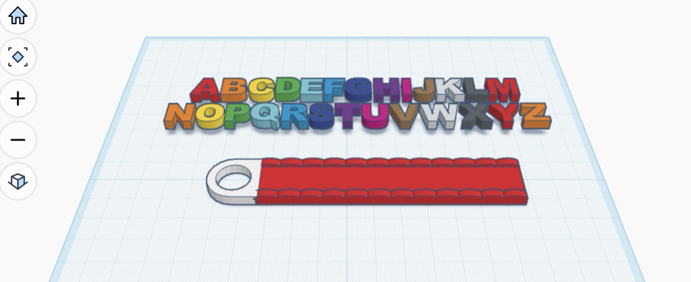 A Tinkercad workplane with a red keychain tag and a row of colorful 3D letters A to Z above it.